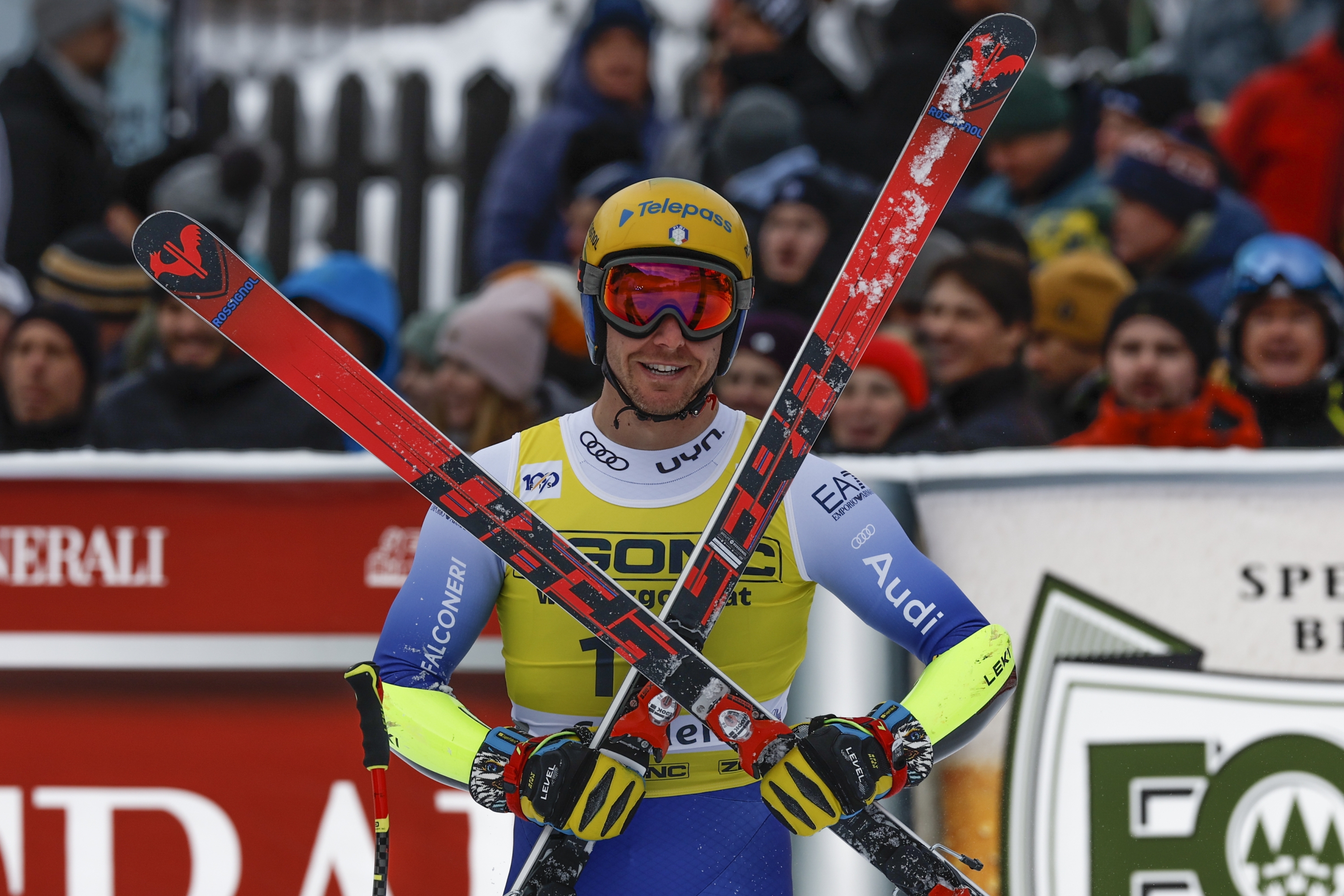 Italy's Mattia Casse gets to the finish area after completing an alpine ski, men's World Cup Super-G in Val Gardena, Italy, Friday, Dec. 20, 2024. (AP Photo/Alessandro Trovati)