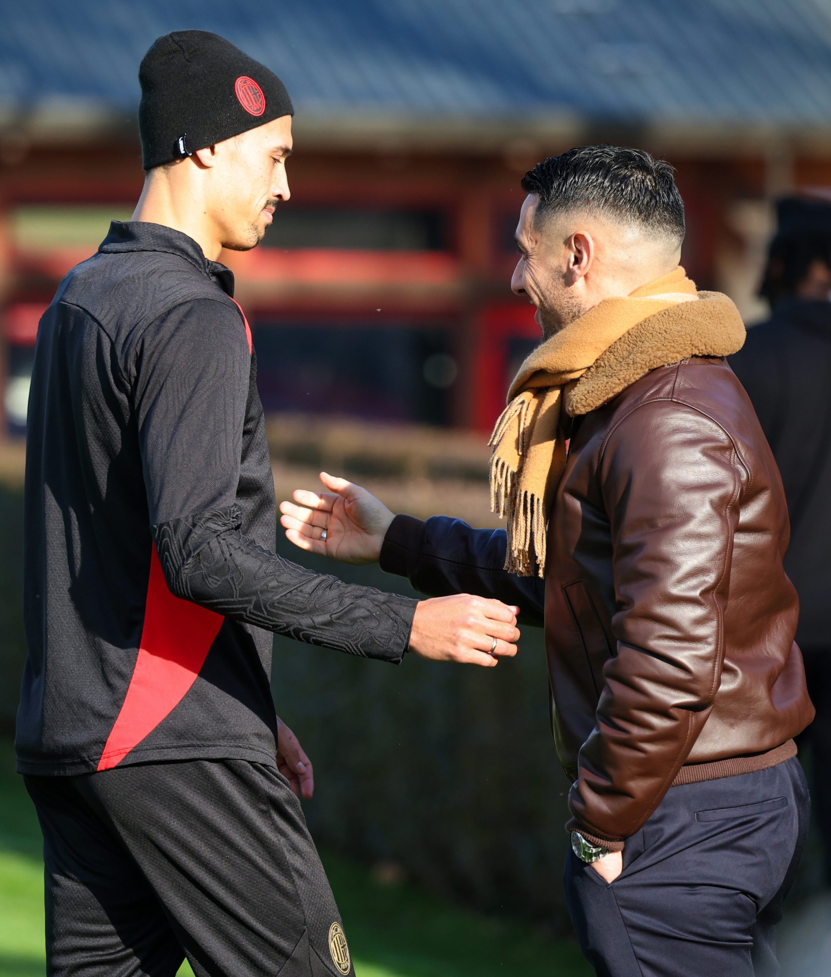 CAIRATE, ITALY - DECEMBER 17: Geoffrey Moncada Technical Director of AC Milan cheers Tijjani Reijnders of AC Milan during a Training Session at Milanello on December 17, 2024 in Cairate, Italy. (Photo by Sara Cavallini/AC Milan via Getty Images)