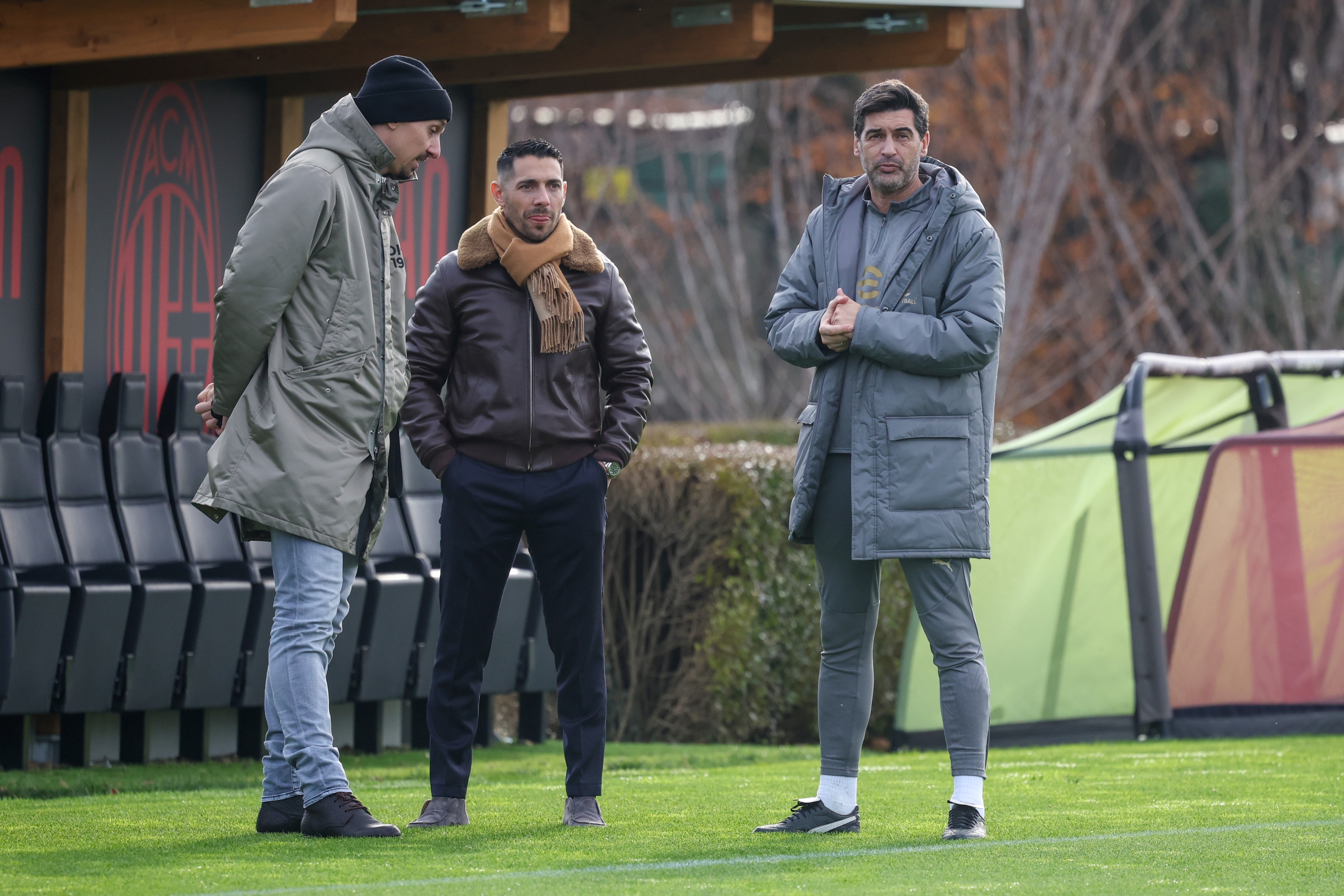 CAIRATE, ITALY - DECEMBER 17: AC Milan Senior Advisor to Ownership Zlatan Ibrahimovic, Geoffrey Moncada Technical Director of AC Milan and Head Coach of AC Milan Paulo Fonseca attend a Training Session at Milanello on December 17, 2024 in Cairate, Italy. (Photo by Sara Cavallini/AC Milan via Getty Images)