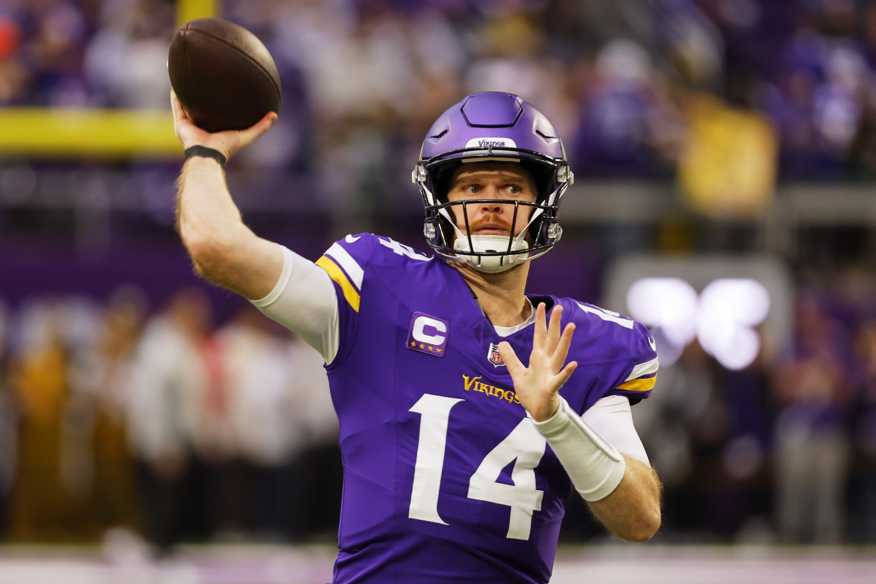 Minnesota Vikings' Sam Darnold warms up before an NFL football game against the Green Bay Packers Sunday, Dec. 29, 2024, in Minneapolis. (AP Photo/Bruce Kluckhohn)