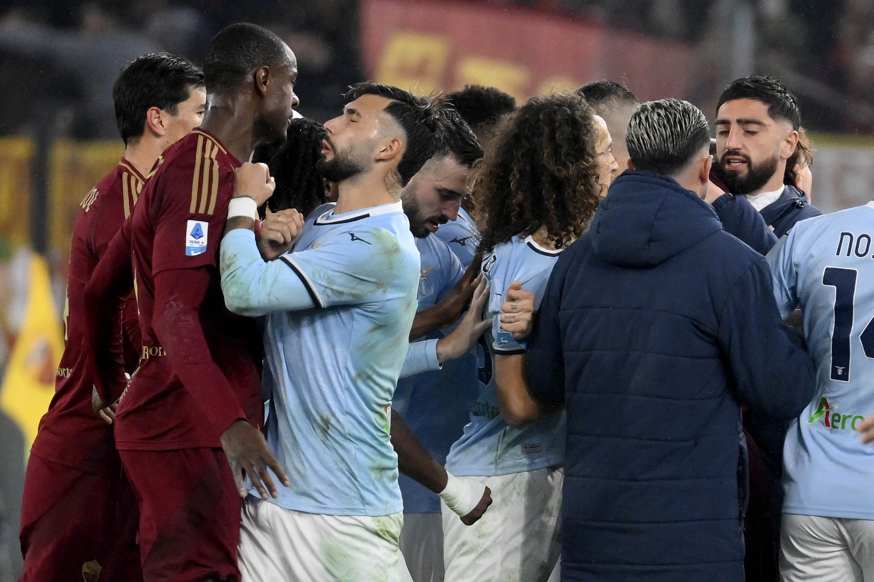 ROME, ITALY - JANUARY 05: Valentin Castellanos of SS Lazio and Artem Ndika of AS Roma reacts during the Serie match between Roma and Lazio at Stadio Olimpico on January 05, 2025 in Rome, Italy. (Photo by Marco Rosi - SS Lazio/Getty Images)