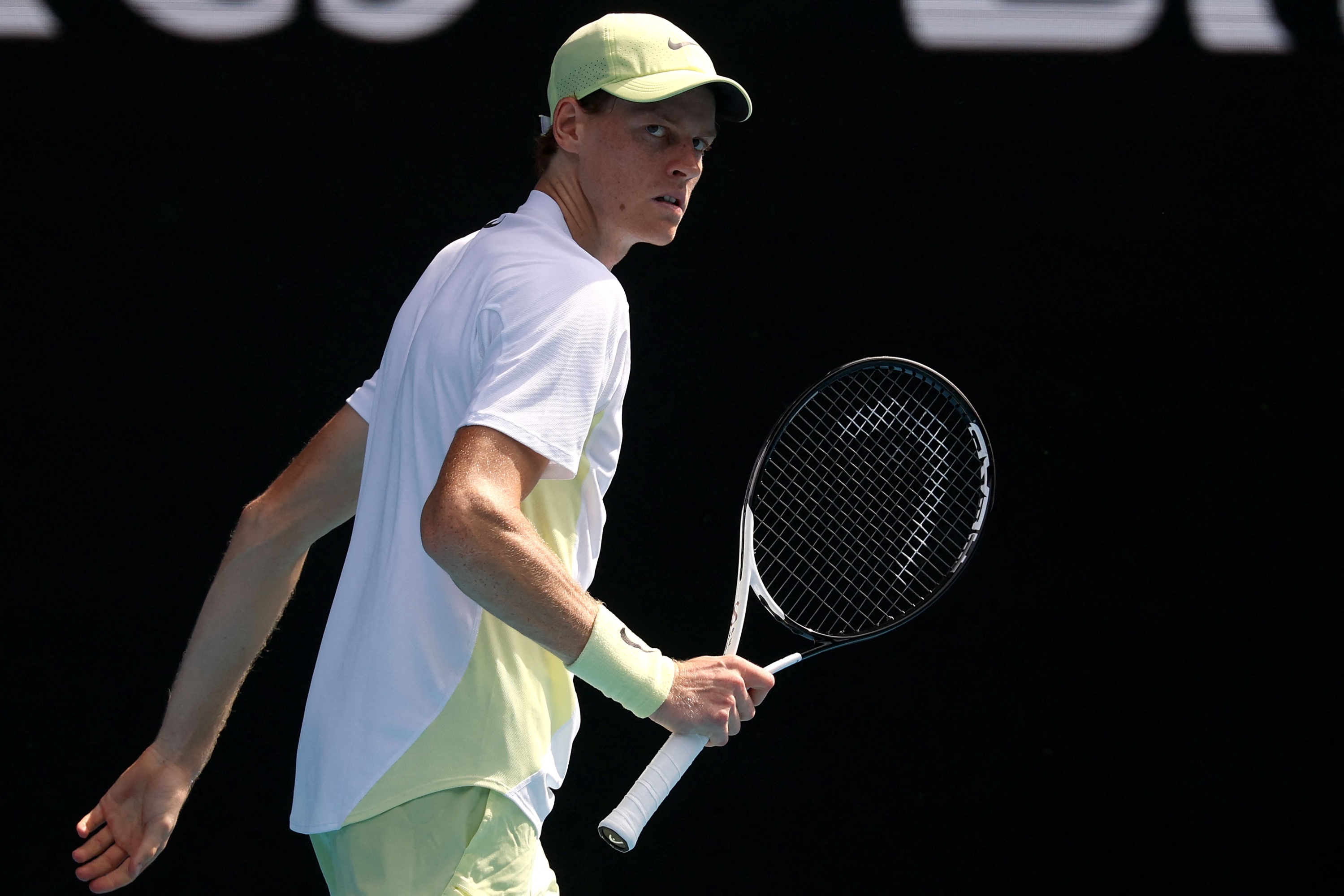 Italy's Jannik Sinner reacts on a point against Chile?s Nicolas Jarry during their men's singles match on day two of the Australian Open tennis tournament in Melbourne on January 13, 2025. (Photo by DAVID GRAY / AFP) / -- IMAGE RESTRICTED TO EDITORIAL USE - STRICTLY NO COMMERCIAL USE --