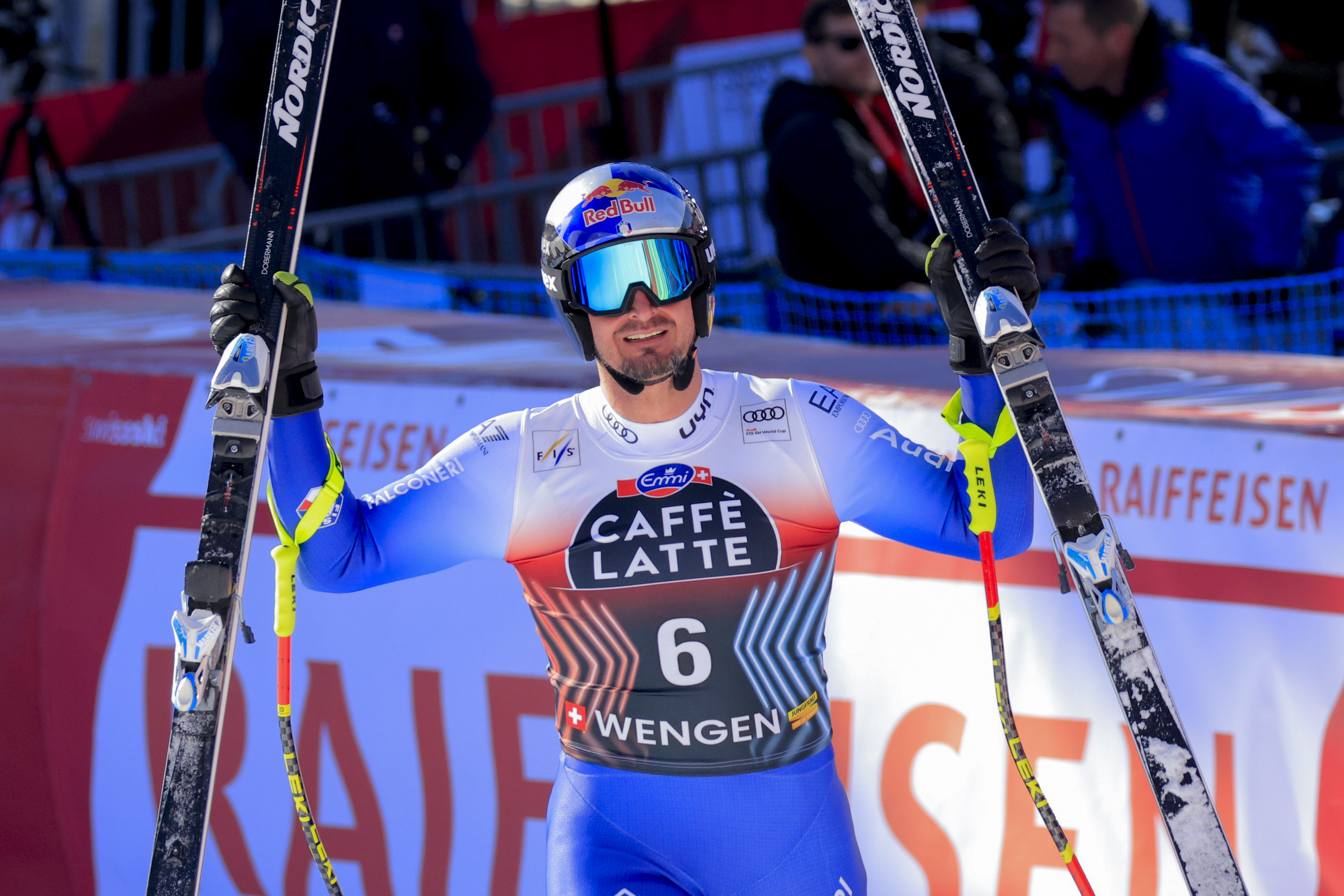 Italy's Dominik Paris celebrates at the finish area of an alpine ski, men's World Cup downhill, in Wengen, Switzerland, Saturday, Jan. 18, 2025 (AP Photo/Giovanni Maria Pizzato)