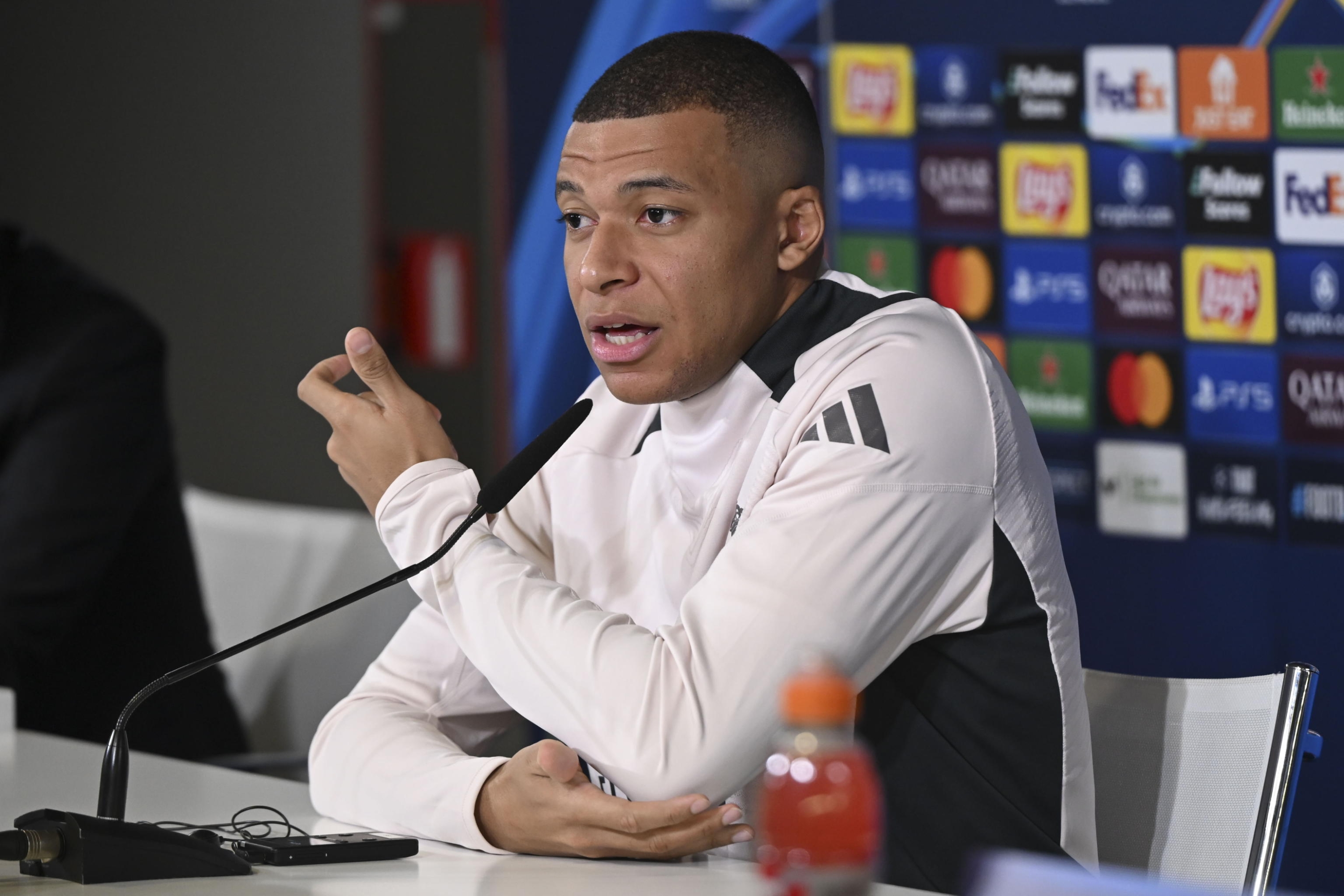 epa11841931 Real Madrid player Kylian Mbappe attends a press conference following a training session of the team in Valdebebas, Madrid, Spain, 21 January 2025. Real Madrid faces FC Salzburg in a UEFA Champions League game at Santiago Bernabeu Stadium on 22 January.  EPA/FERNANDO VILLAR