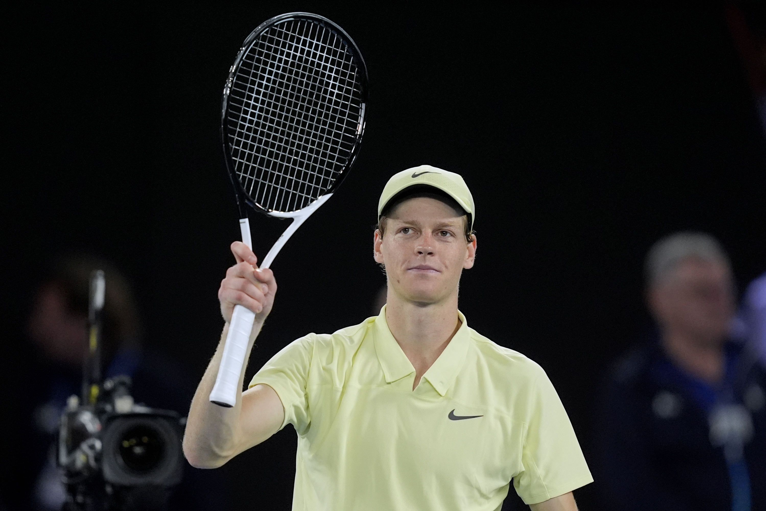 Jannik Sinner of Italy celebrates after defeating Ben Shelton of the U.S. in their semifinal match at the Australian Open tennis championship in Melbourne, Australia, Friday, Jan. 24, 2025. (AP Photo/Asanka Brendon Ratnayake)