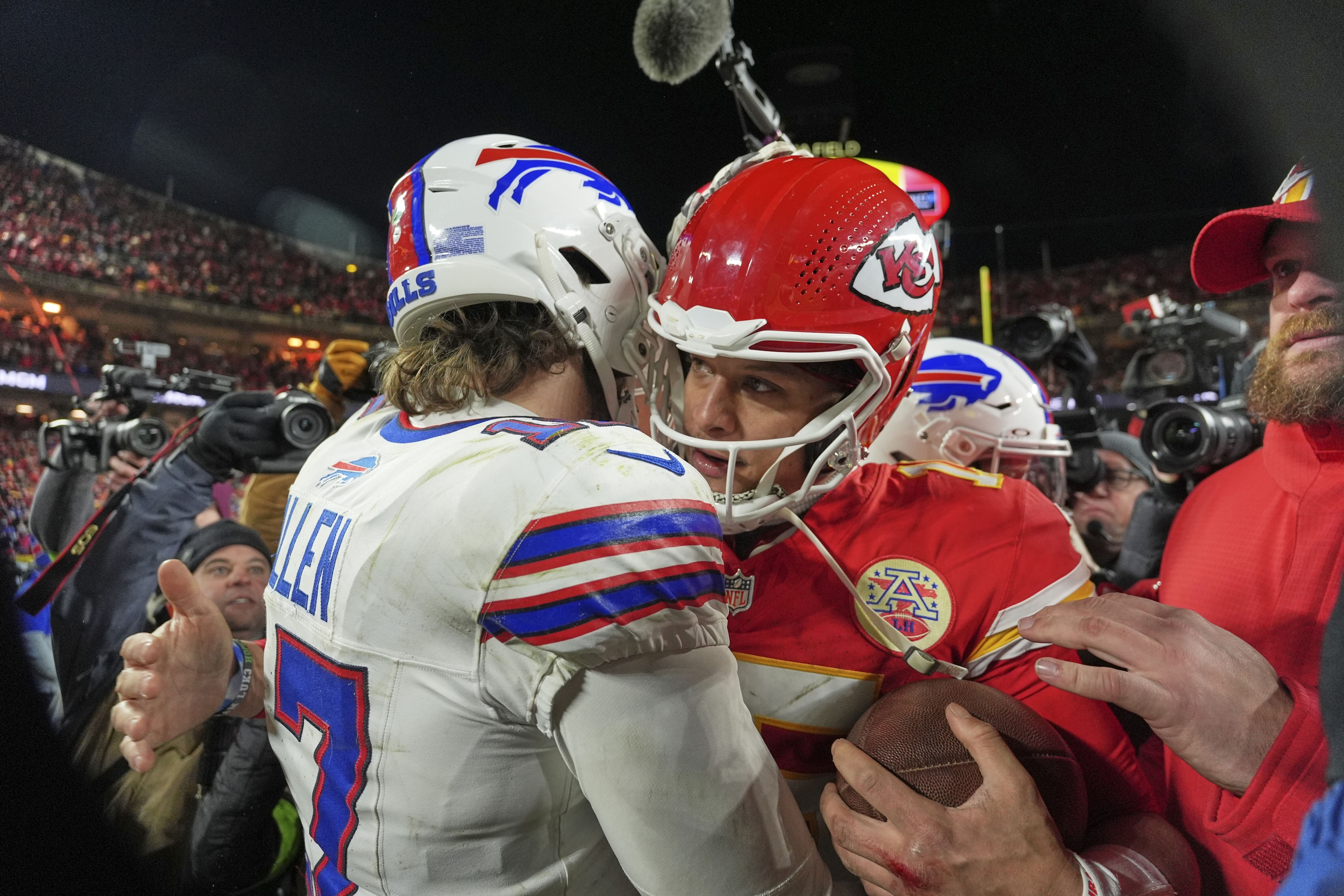 Buffalo Bills quarterback Josh Allen, left, and Kansas City Chiefs quarterback Patrick Mahomes hug after the AFC Championship NFL football game, Sunday, Jan. 26, 2025, in Kansas City, Mo. (AP Photo/Charlie Riedel)