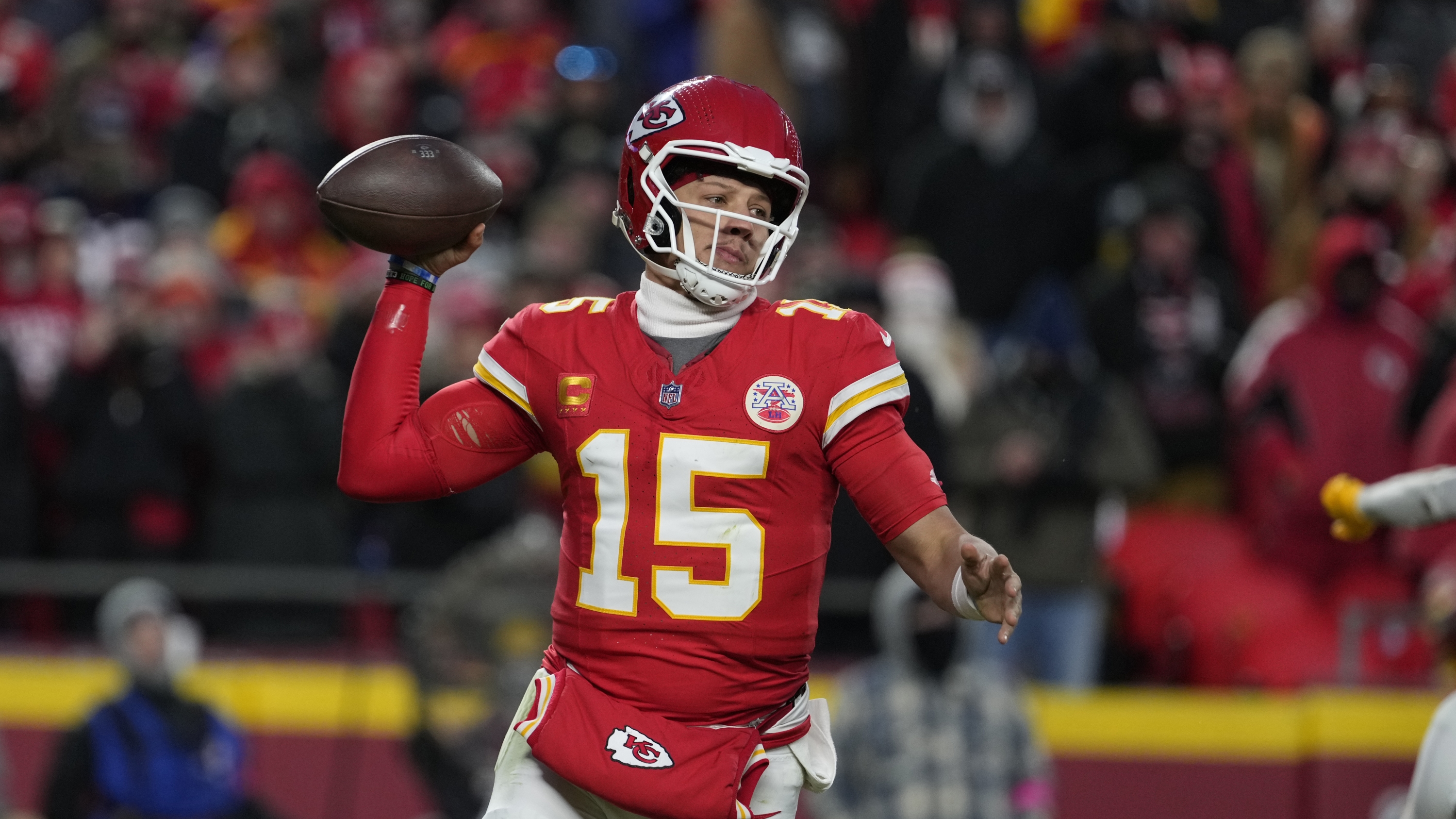 Kansas City Chiefs quarterback Patrick Mahomes (15) throws during the second half of an NFL football AFC divisional playoff game against the Houston Texans Saturday, Jan. 18, 2025, in Kansas City, Mo. (AP Photo/Ed Zurga)