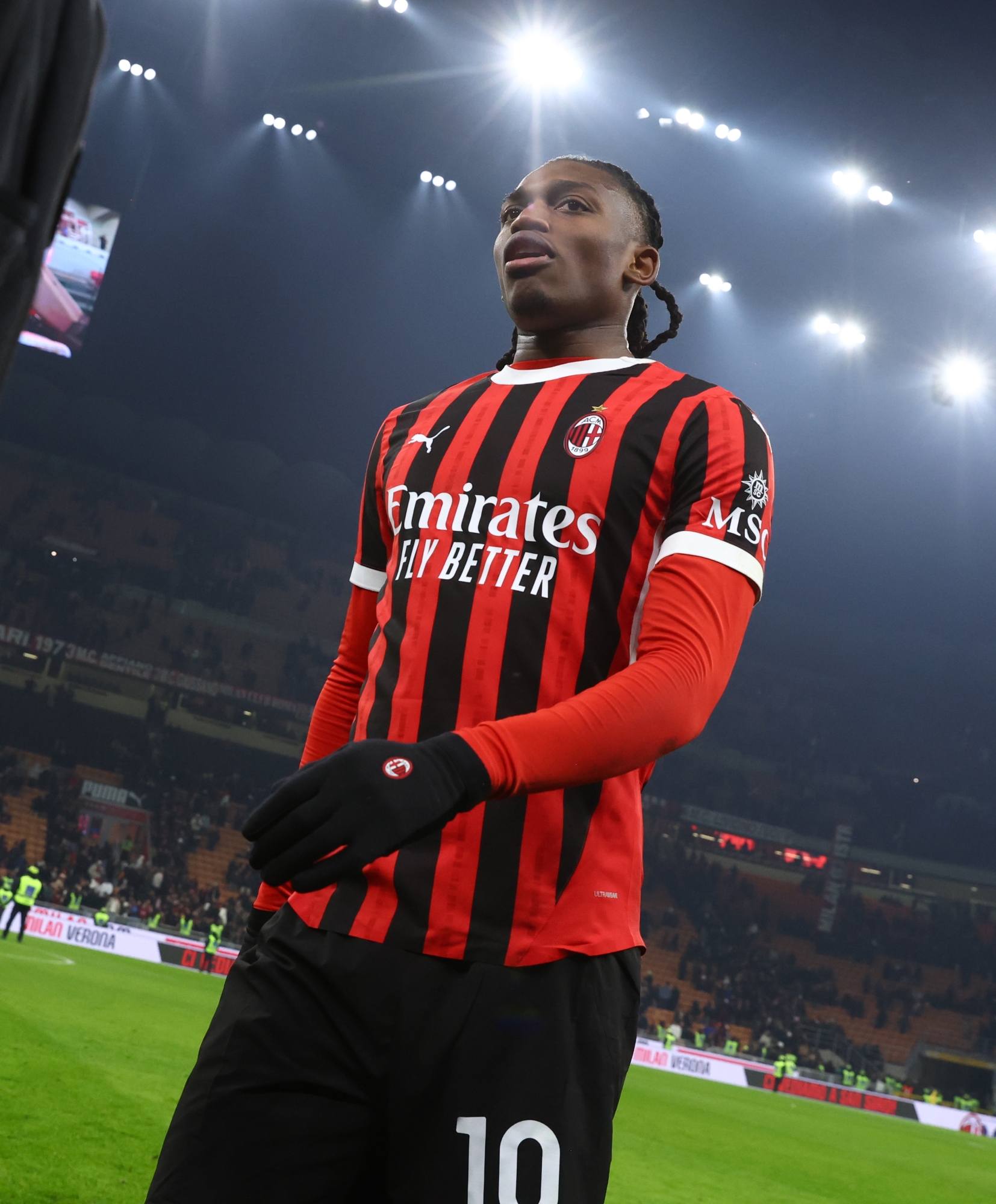 MILAN, ITALY - FEBRUARY 05:  Rafael Leao of AC Milan celebrates the win at the end of the Coppa Italia Quarter Final match between AC Milan and AS Roma at Stadio Giuseppe Meazza on February 05, 2025 in Milan, Italy. (Photo by Giuseppe Cottini/AC Milan via Getty Images)