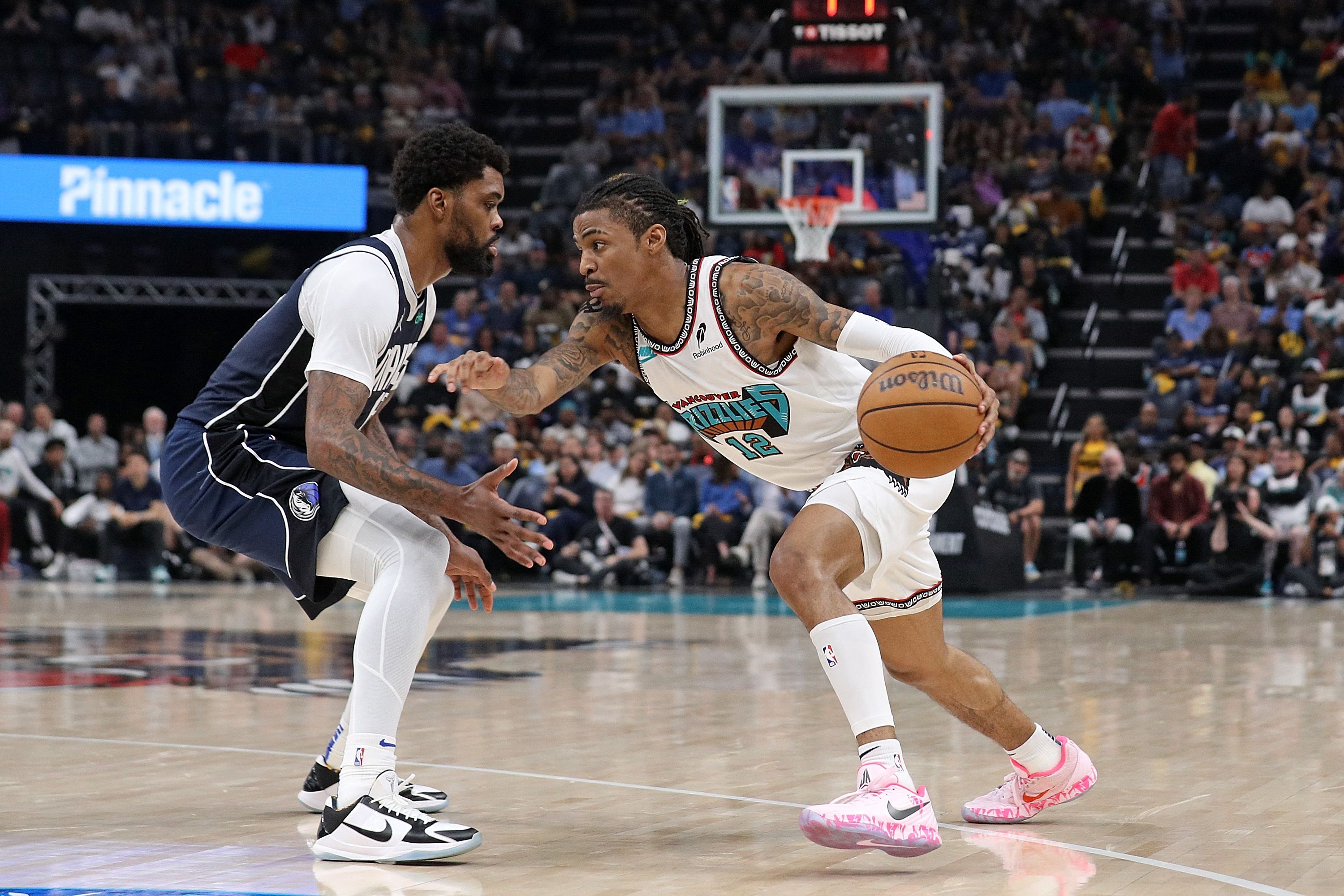 Ja Morant handles the ball