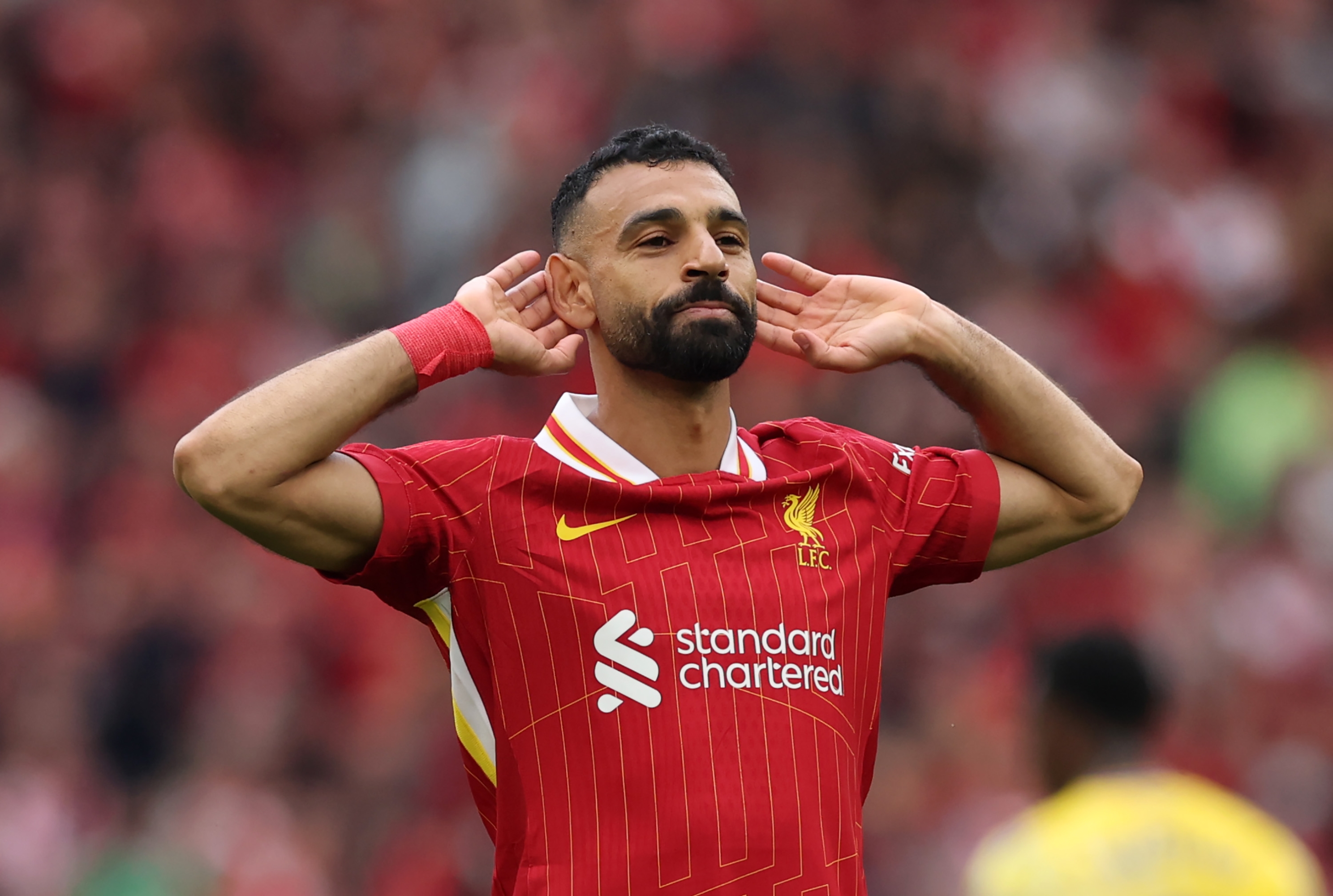 Mohamed Salah of Liverpool celebrates scoring his team's first goal during the Premier League match between Liverpool FC and Crystal Palace FC at Anfield on May 25, 2025 in Liverpool, England. (Photo by Carl Recine/Getty Images)