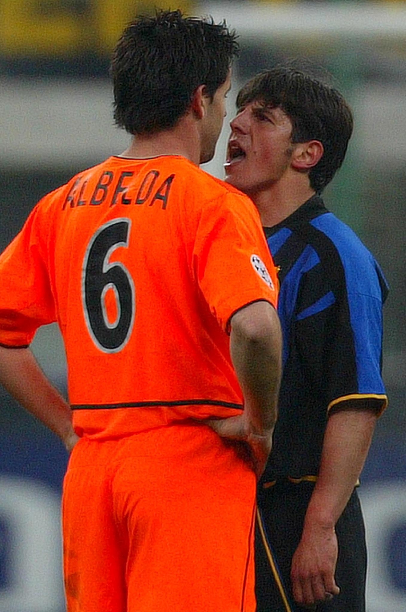 INTER VS VALENCIA Inter Milan's Emre (R) shout on face of David Albelda of Valencia during their Champions League quarter-final first leg match at the San Siro stadium in Milan April 9, 2003. Inter Milan beat Valencia 1-0. REUTERS/Stefano Rellandini