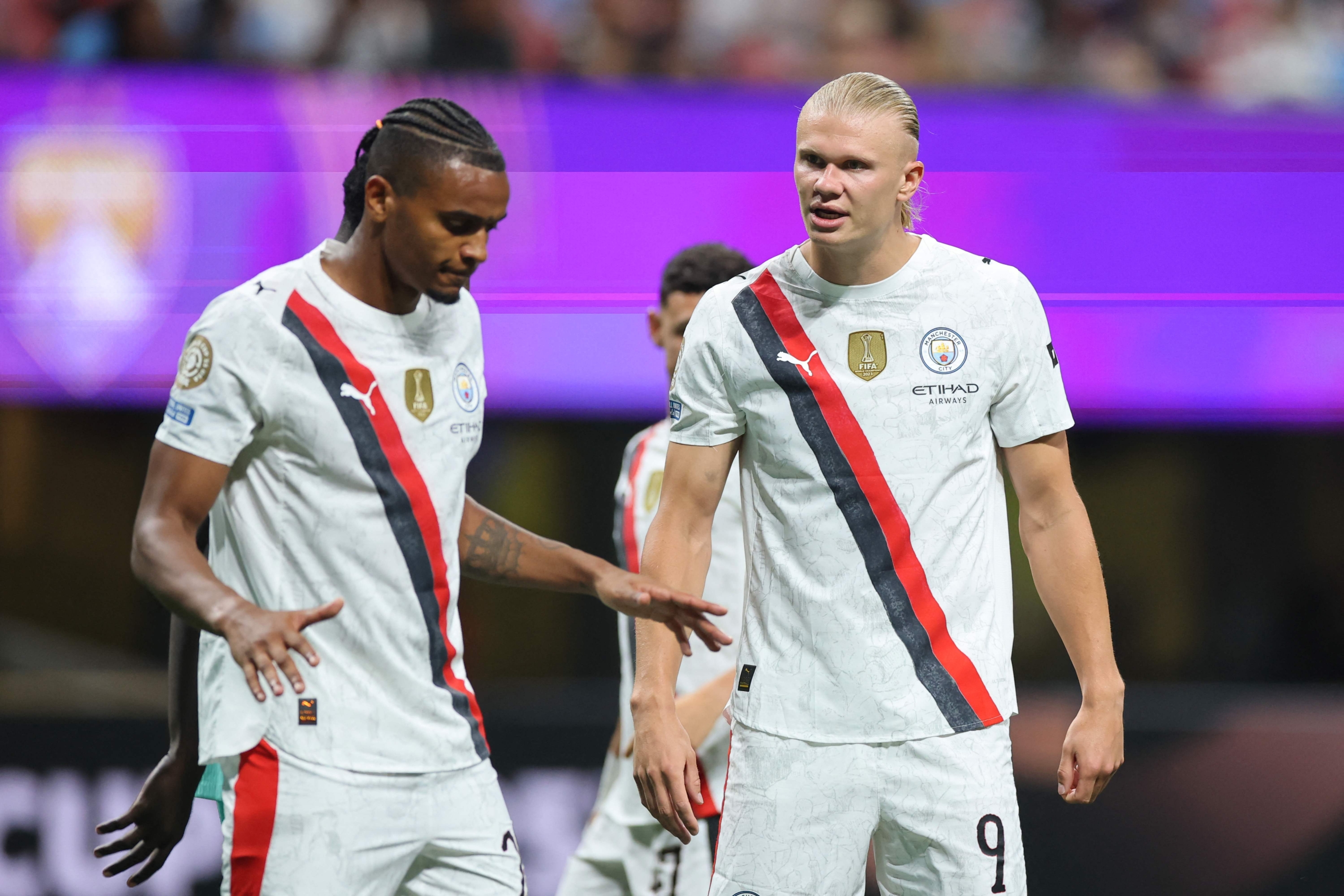 Manuel Akanji and Erling Haaland #9 of Manchester City interact during the FIFA Club World Cup 2025 group G match between Manchester City FC and Al Ain FC at Mercedes-Benz Stadium on June 22, 2025 in Atlanta, Georgia. Alex Grimm/Getty Images/AFP (Photo by ALEX GRIMM / GETTY IMAGES NORTH AMERICA / Getty Images via AFP)