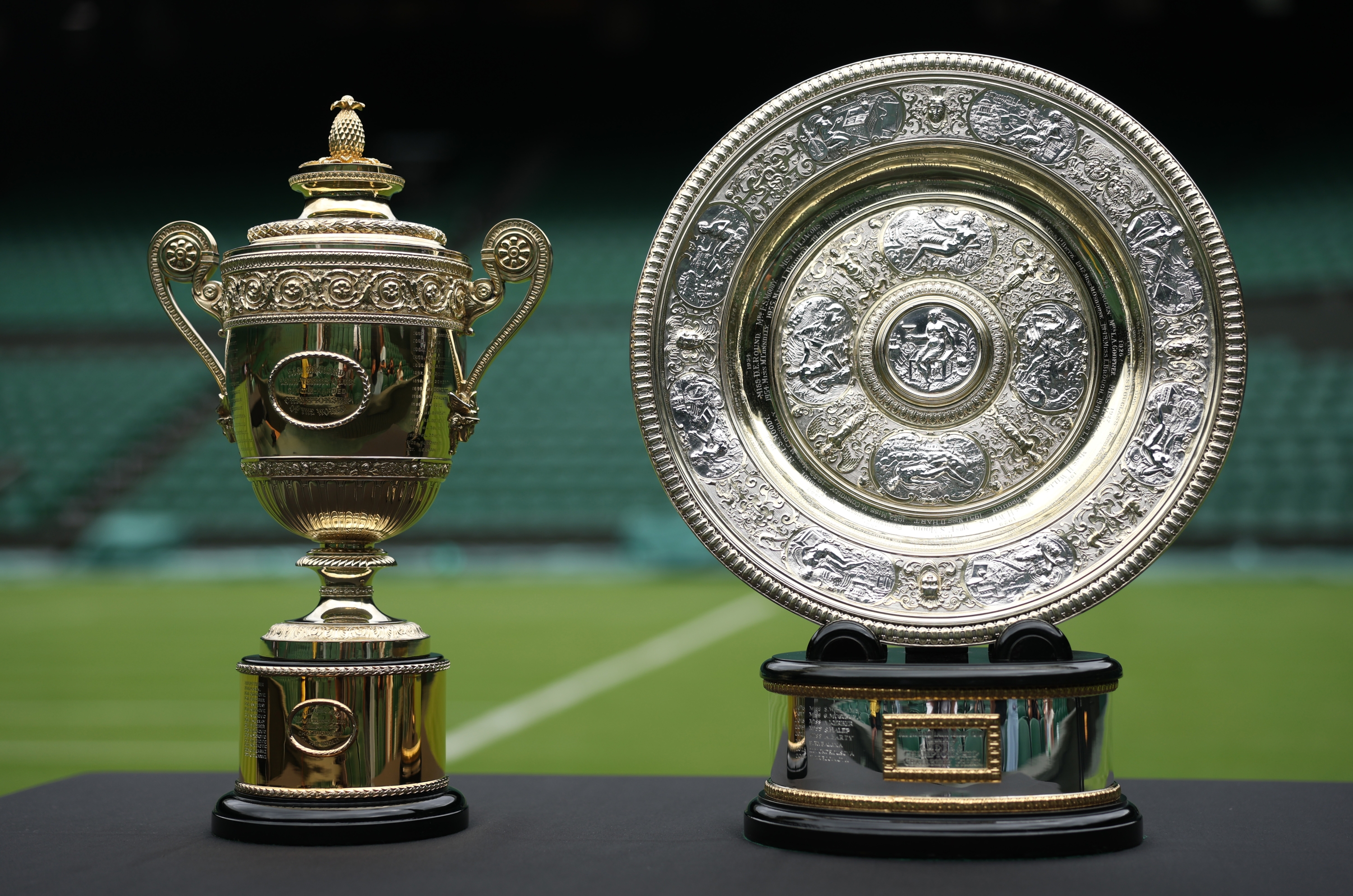 A general view of theGentlemen's Singles Trophy, The Cup, and Ladies' Singles Trophy, the The Venus Rosewater Dish, prior to The Championships Wimbledon 2025 at All England Lawn Tennis and Croquet Club on June 28, 2025 in London, England. (Photo by Julian Finney/Getty Images)