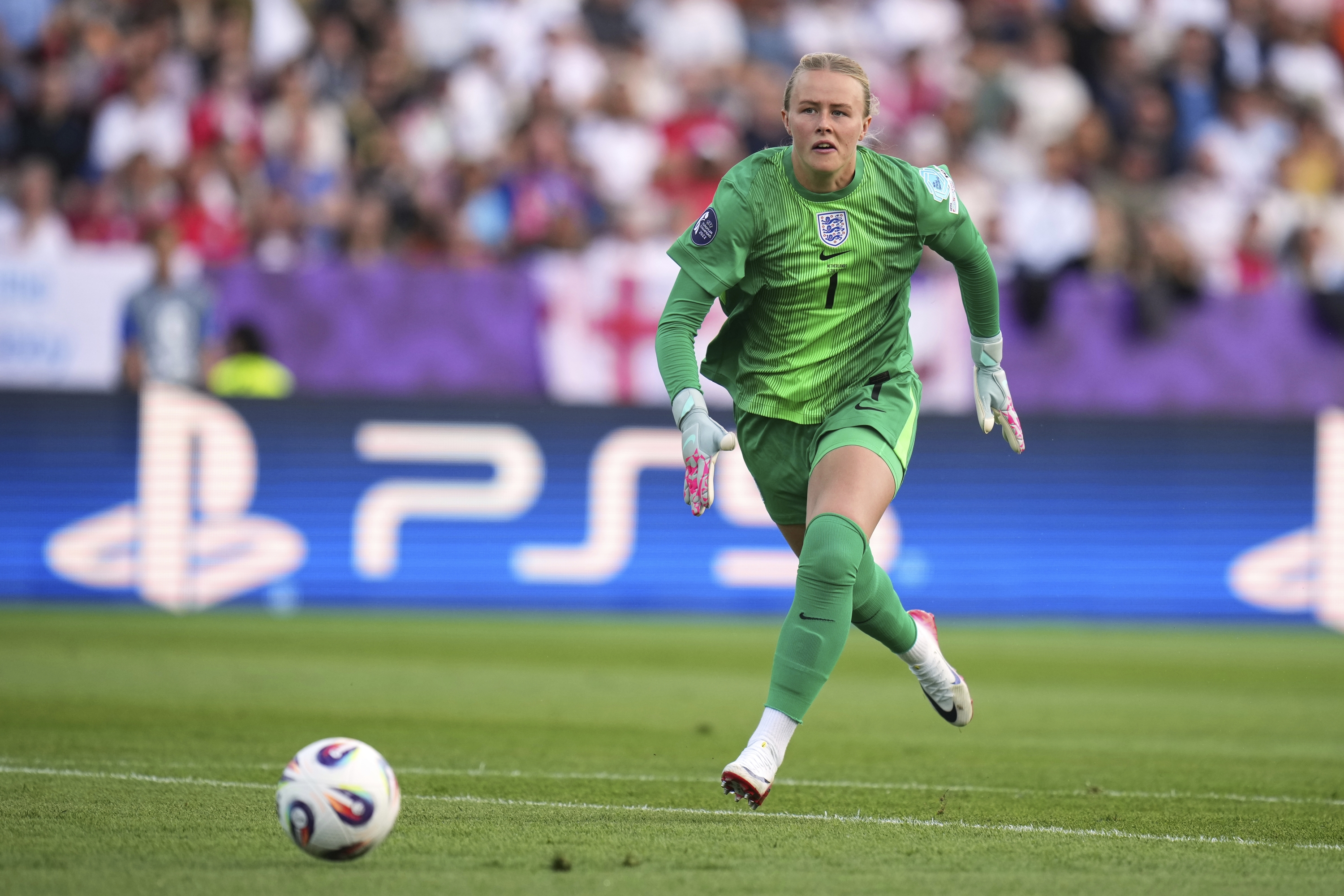 England goalkeeper Hannah Hampton runs for the ball during the Euro 2025, group D, soccer match between England and the Netherlands at Stadion Letzigrund in Zurich, Switzerland, Wednesday, July 9, 2025. (AP Photo/Alessandra Tarantino)
