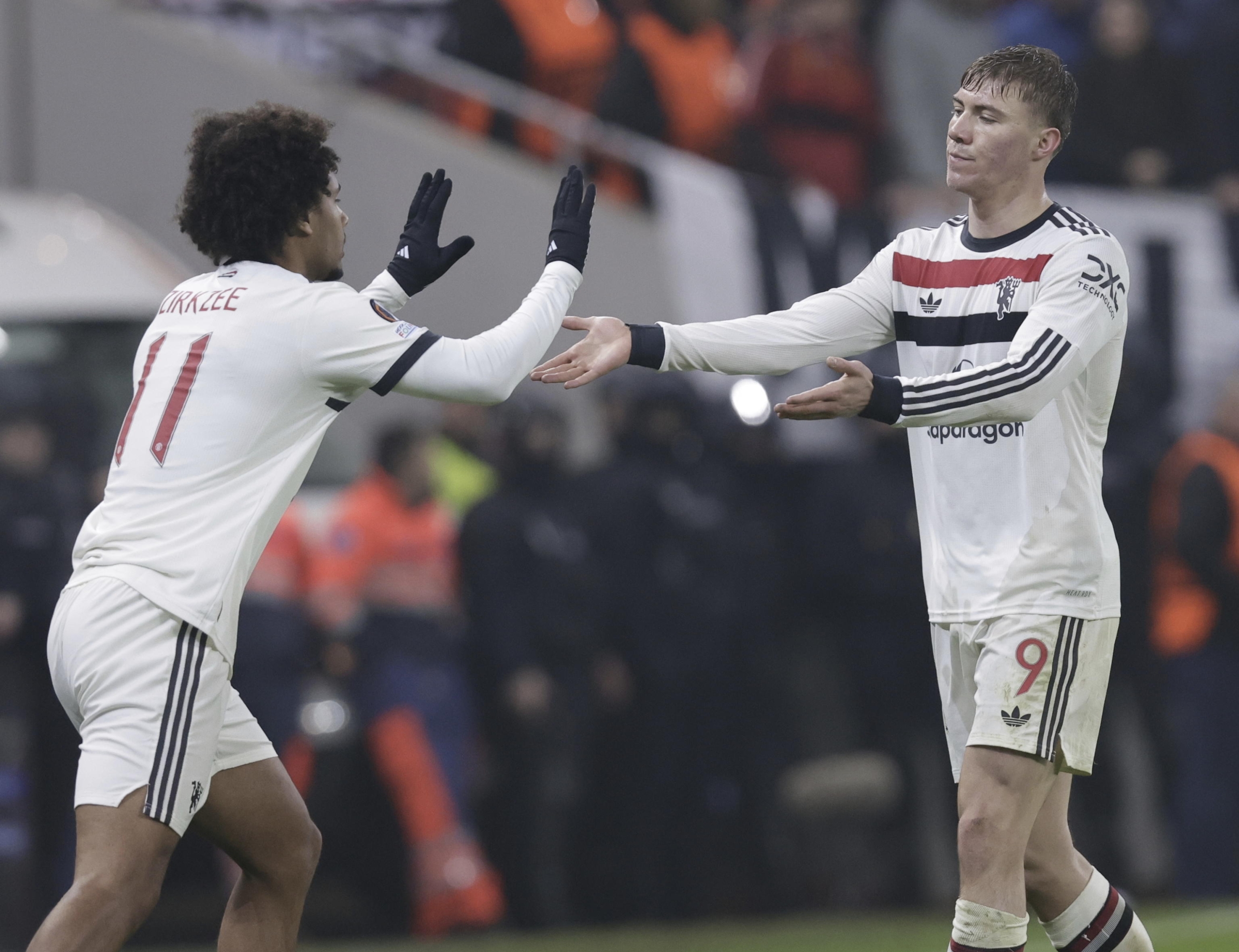 epa11865100 Manchester United's Joshua Zirkzee (L) and Rasmus Hojlund react during the UEFA Europa League match between FCSB and Manchester United in Bucharest, Romania, 30 January 2025.  EPA/ROBERT GHEMENT