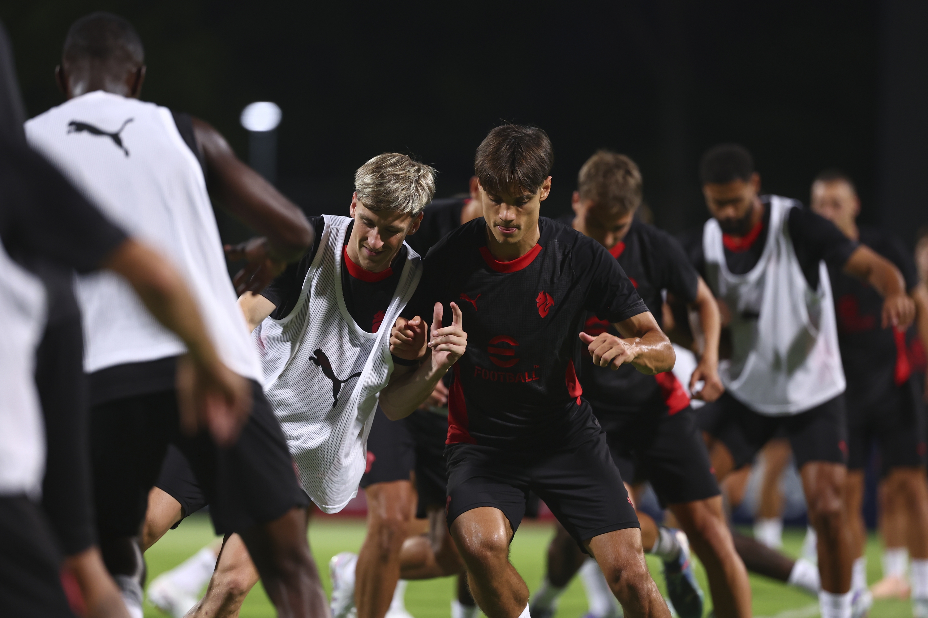 Alexis Saelemaekers (L) of AC Milan and Samuele Ricci (R) in action during an AC Milan Training Session at Bishan Stadium on July 22, 2025 in Singapore. (Photo by Giuseppe Cottini/AC Milan via Getty Images)