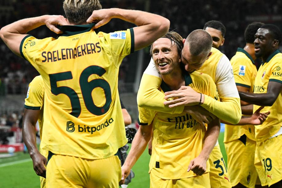 Luka Modric celebrating his goal for AC Milan at San Siro