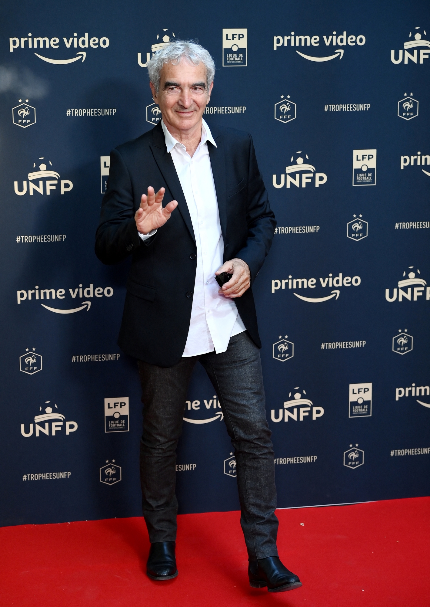 Former national head coach Raymond Domenech poses ahead of the TV show on May 15, 2022 in Paris, as part of the 30th edition of the UNFP (French National Professional Football players Union) trophy ceremony. (Photo by FRANCK FIFE / AFP)