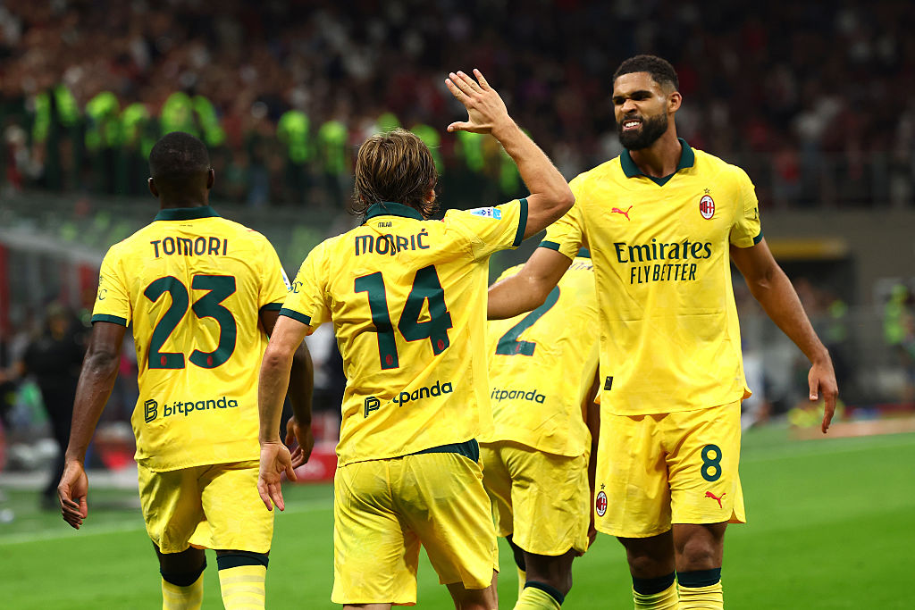 Luka Modric of AC Milan celebrates with Ruben Loftus-Cheek after scoring the his team's first goal during the Serie A match between AC Milan and Bologna FC 1909 at Giuseppe Meazza Stadium on September 14, 2025 in Milan, Italy. (Photo by Giuseppe Cottini/AC Milan via Getty Images)