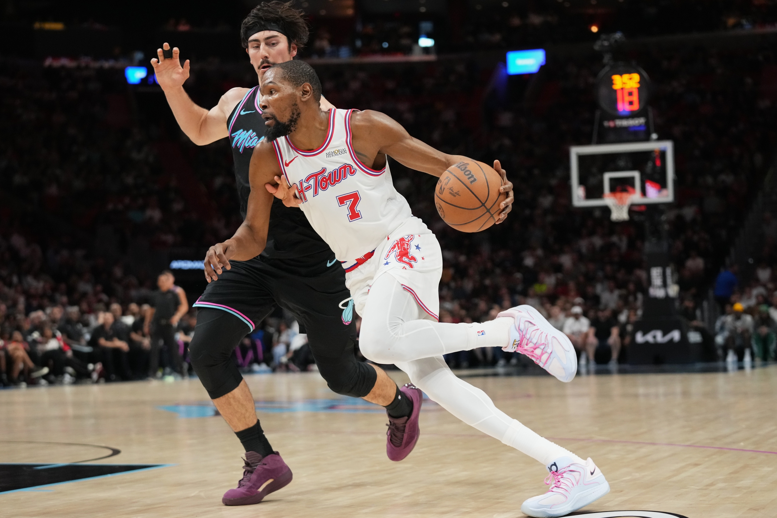 Houston Rockets forward Kevin Durant (7) drives to the basket as Miami Heat forward Jaime Jaquez Jr., left, defends during the second half of an NBA basketball game, Saturday, Feb. 28, 2026, in Miami. (AP Photo/Lynne Sladky)