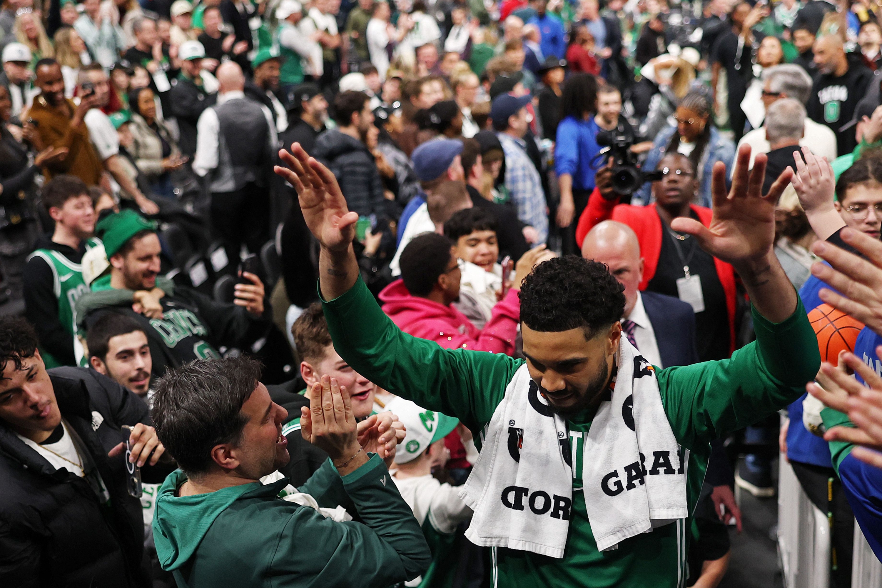  Jayson Tatum #0 of the Boston Celtics walks through a crowd of fans to get to the locker room after the Celtics defeat the Dallas Mavericks 120-100 at TD Garden on March 06, 2026 in Boston, Massachusetts. NOTE TO USER: User expressly acknowledges and agrees that, by downloading and/or using this Photograph, user is consenting to the terms and conditions of the Getty Images License Agreement.   Maddie Meyer/Getty Images/AFP (Photo by Maddie Meyer / GETTY IMAGES NORTH AMERICA / Getty Images via AFP)