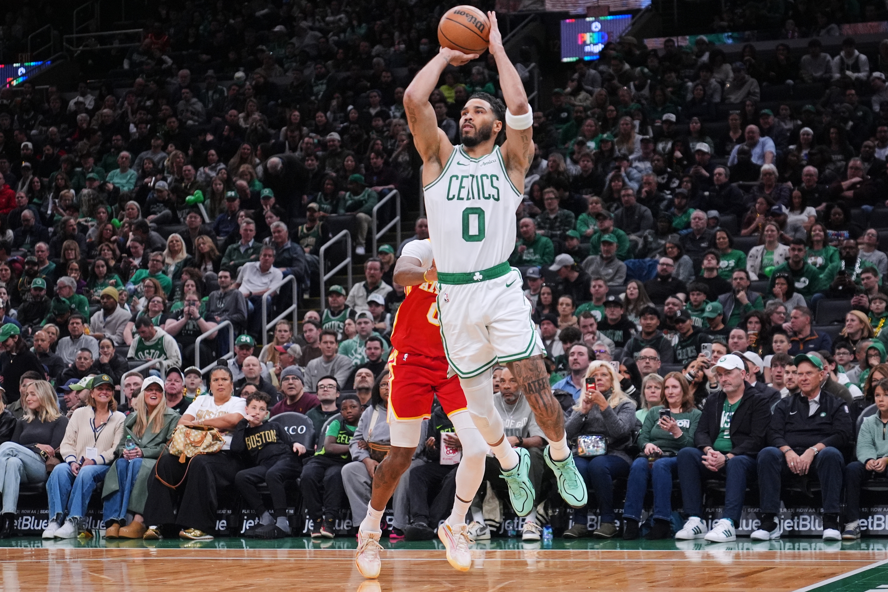 Boston Celtics forward Jayson Tatum (0) drives to the basket against the Atlanta Hawks during the first half of an NBA basketball game, Friday, March 27, 2026, in Boston. (AP Photo/Charles Krupa)