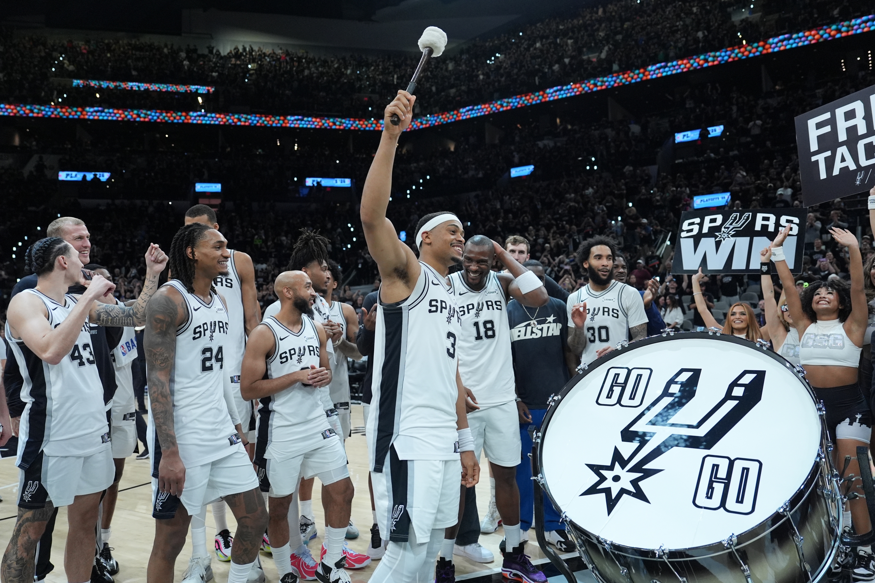 San Antonio Spurs forward/guard Keldon Johnson (3) celebrates with teammates after Game 5 of a first-round NBA playoffs basketball series against the Portland Trail Blazers in San Antonio, Tuesday, April 28, 2026. (AP Photo/Eric Gay)